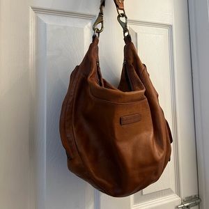 Gently used. Rich leather bag from Frye. No rips or stain.